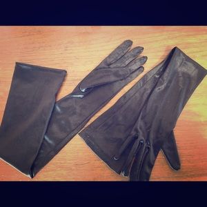 Black nylon gloves extent upper arm